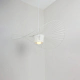 White fabric hat pendant light with a wide curved shade