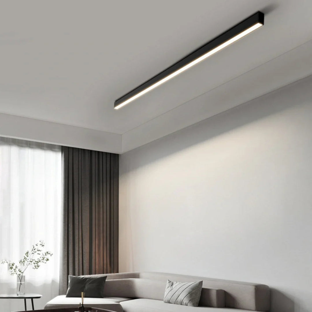 Black linear LED flush ceiling light with a slim metal profile