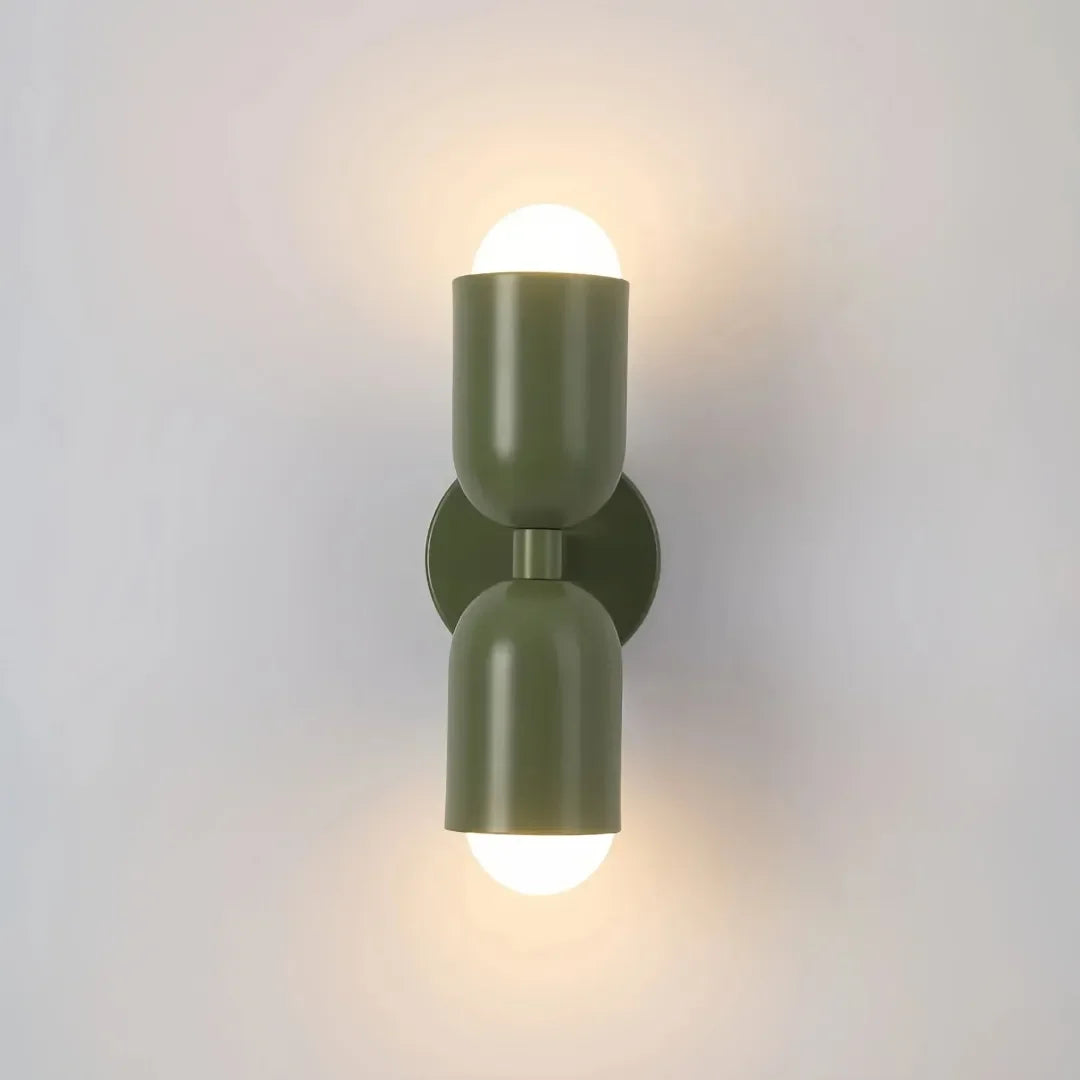 Morandi wall light mounted beside a bed