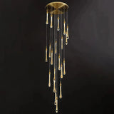 Gold teardrop crystal chandelier with a round ceiling canopy