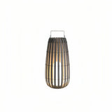 Tall woven rattan outdoor floor lantern with carry handle and integrated LED light