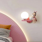 Pink children's bedroom wall light with cartoon girl, rabbit and moon design