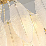 Close-up of textured glass feathers and pearl-effect decorative beads
