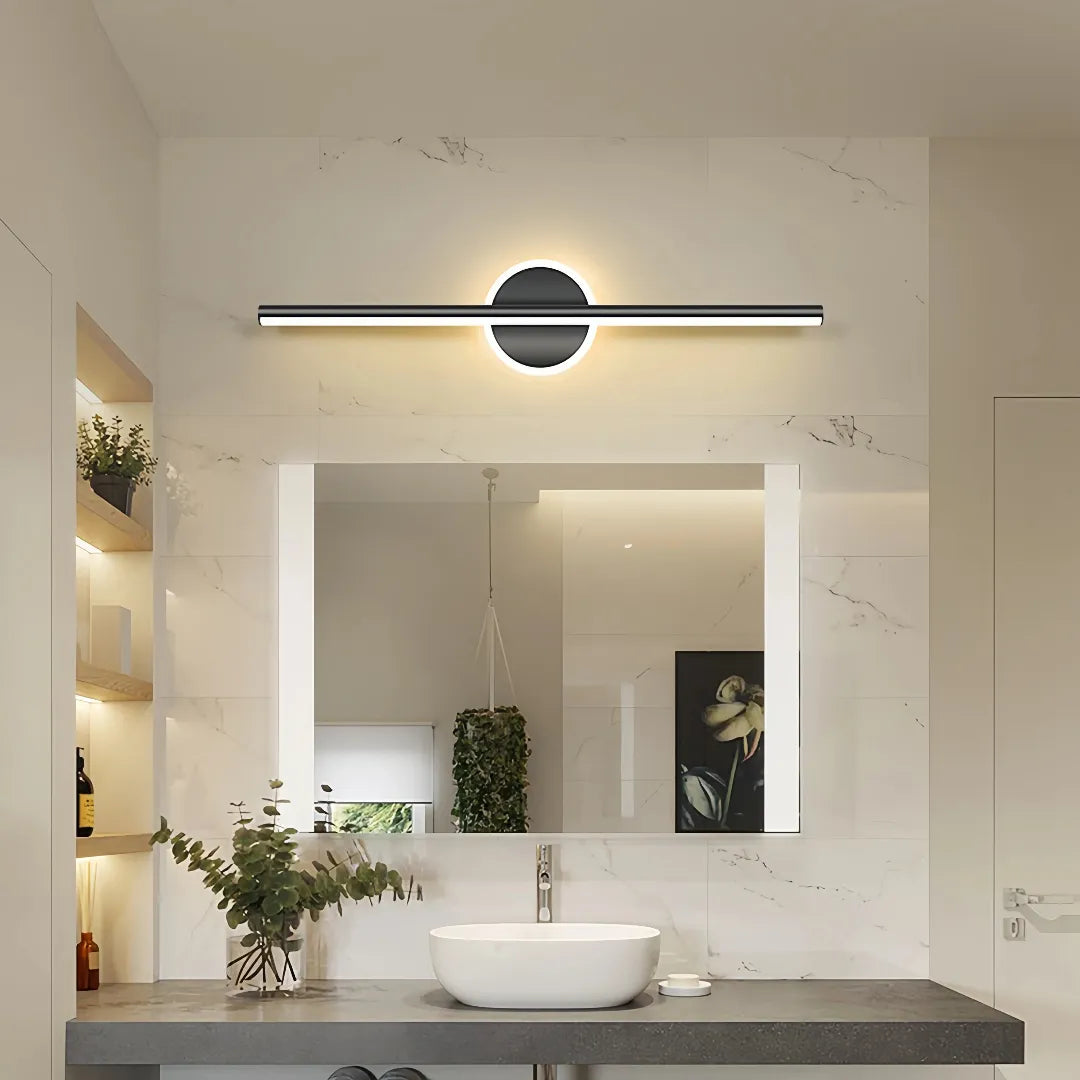 Black linear LED mirror light installed above a bathroom vanity