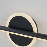 Close-up of the metal body and silicone diffuser on the bathroom mirror light