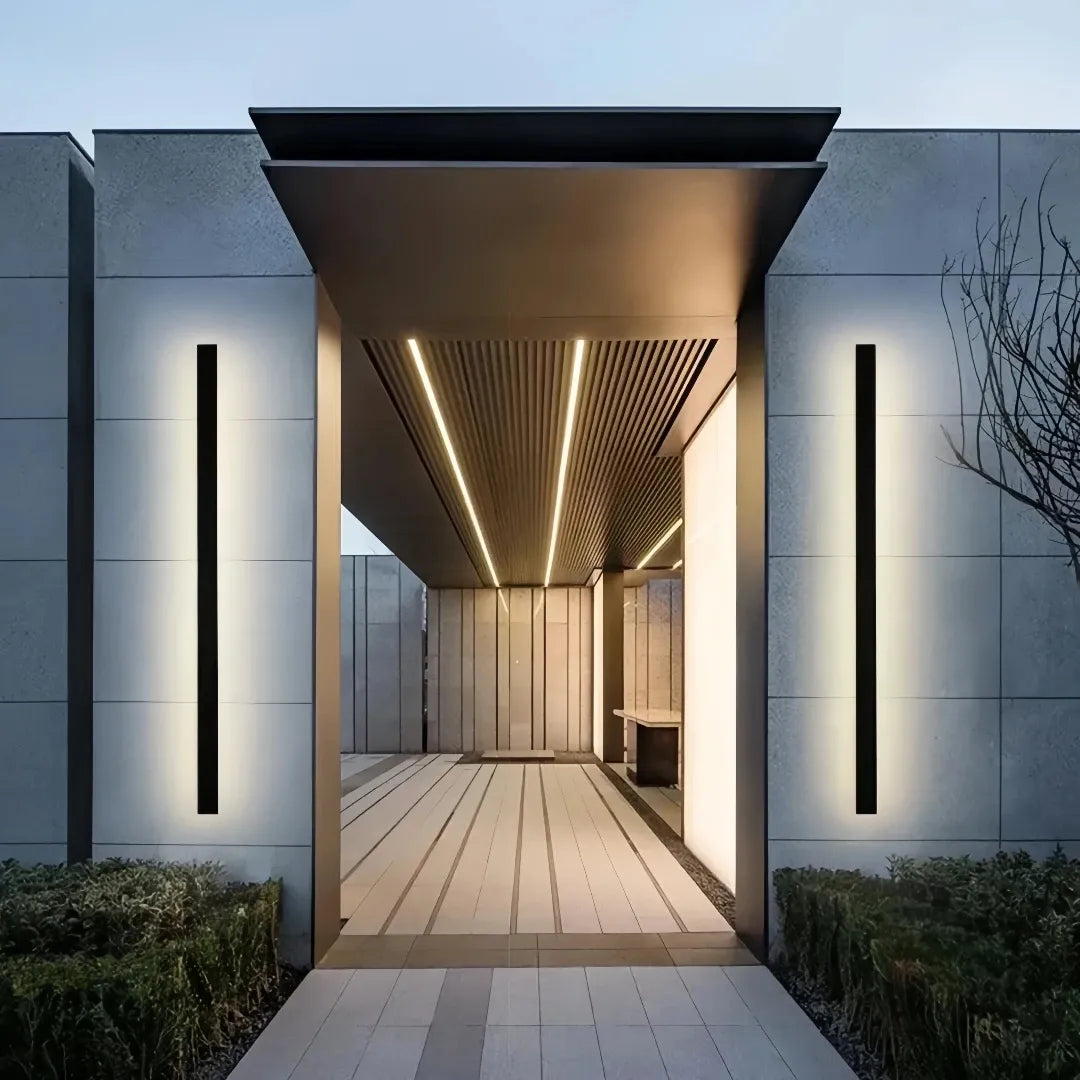 Slim black metal outdoor wall light with acrylic diffuser