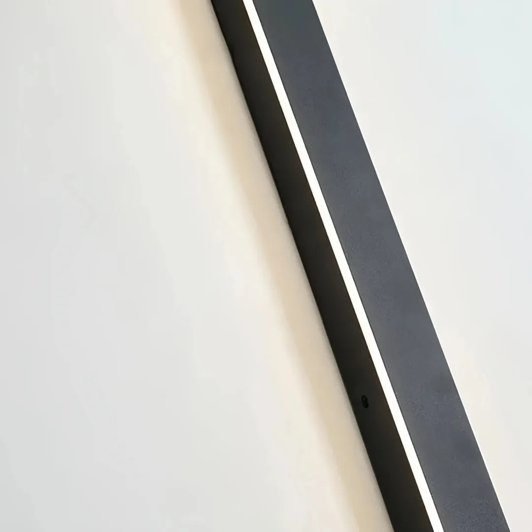 Slim black metal outdoor wall light with acrylic diffuser