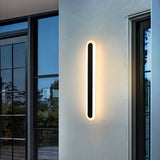 Slim black linear wall light with integrated LED