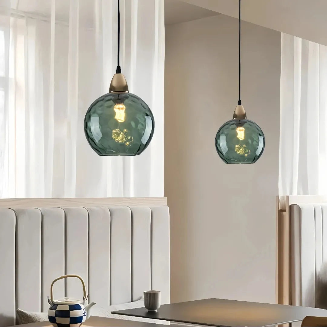 Modern LED pendant light creating a warm ambient glow in dining room