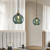 Modern LED pendant light creating a warm ambient glow in dining room