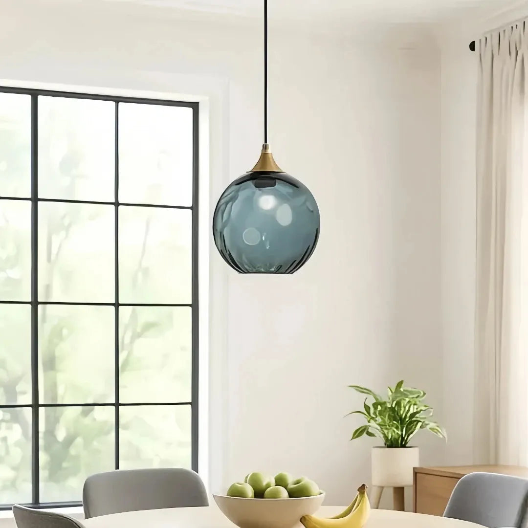 Blue glass ball pendant light, front view