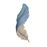 Close-up of the feather-shaped wall light