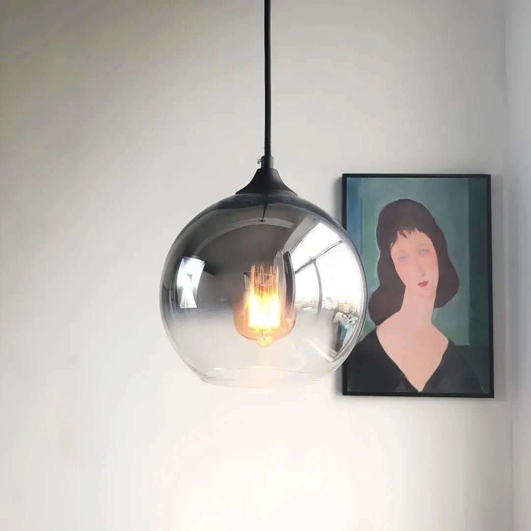 Modern glass globe pendant light in a silver finish