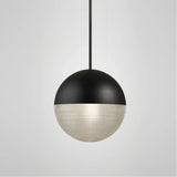 Black glass globe pendant light with decorative grid shade