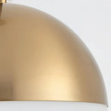 Gold metal fitting on a modern glass globe pendant light