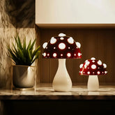 Small and large white mushroom lamps with three light colour examples
