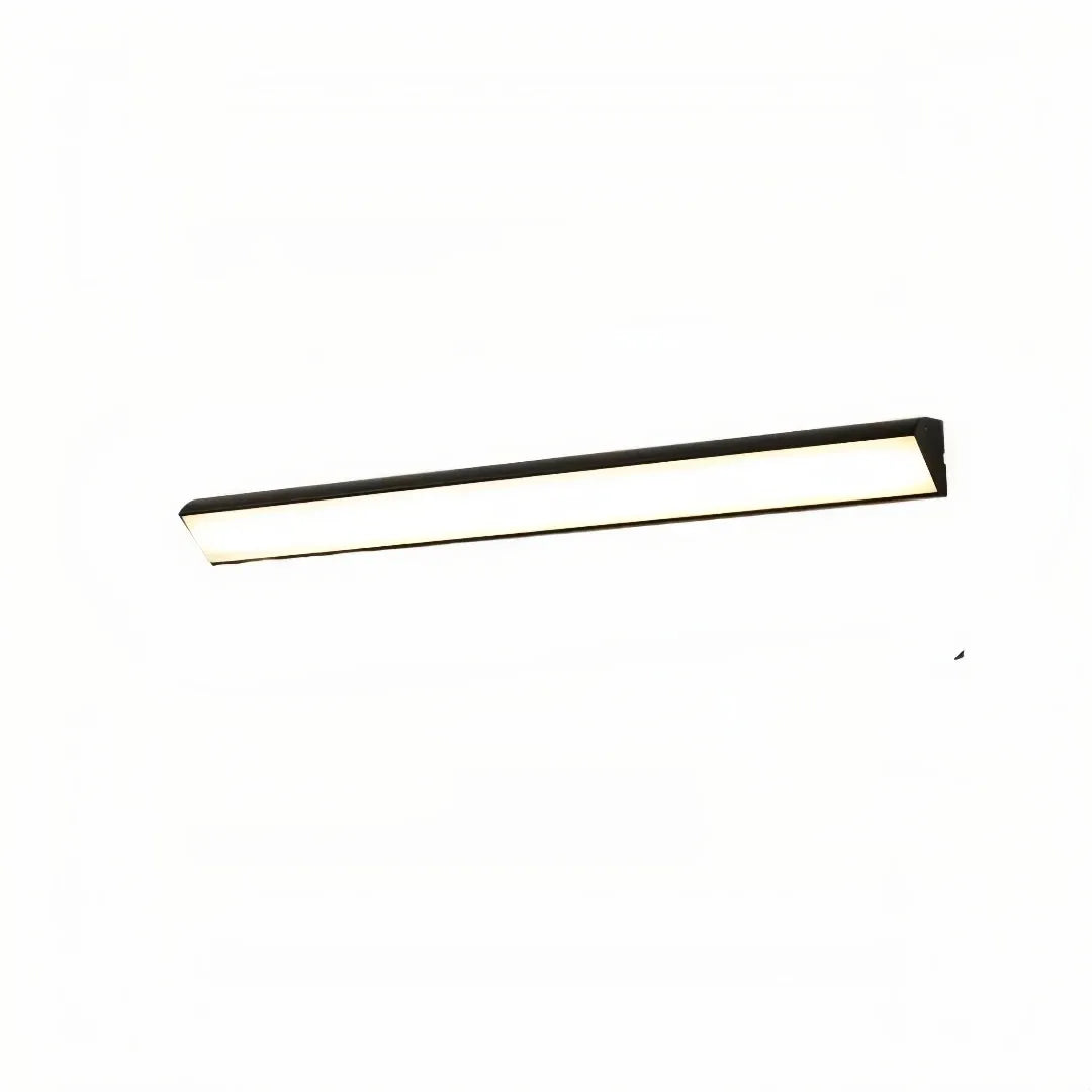Black linear LED wall light with an illuminated diffuser
