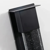 Close-up of the upper black housing on the outdoor wall light