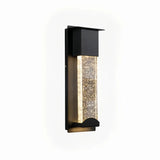 Detail of the black wall light housing and bubble-textured crystal glass panel