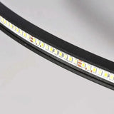 Close-up of the integrated LED strip inside the black ceiling light frame