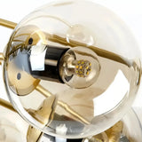 Close-up of a clear glass globe and lamp holder