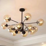 Black 12-light Sputnik chandelier with amber glass globes