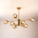 Gold 8-light Sputnik chandelier with amber glass globes