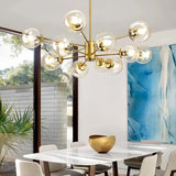 Gold Sputnik glass globe chandelier above a dining table