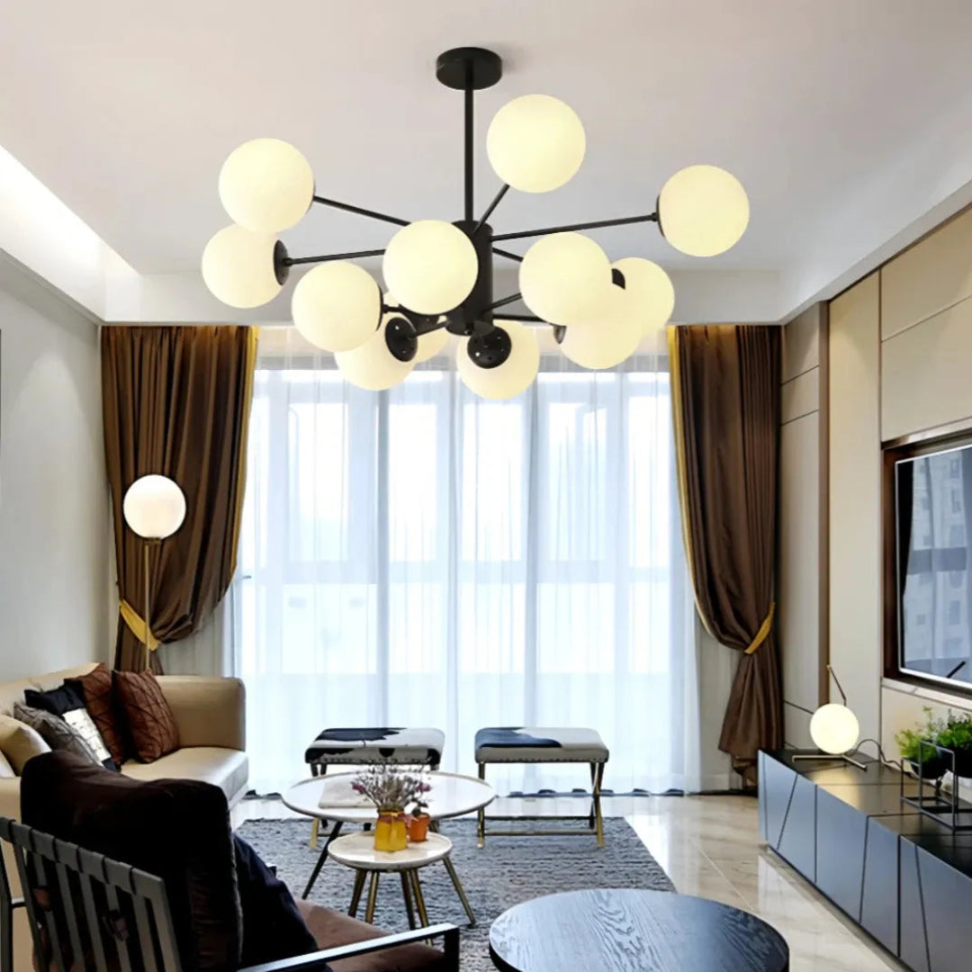 Black Sputnik chandelier with white glass globes in a living room