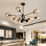 Black Sputnik chandelier with amber glass globes in a living room