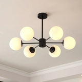 Black 6-light Sputnik chandelier with white glass globes