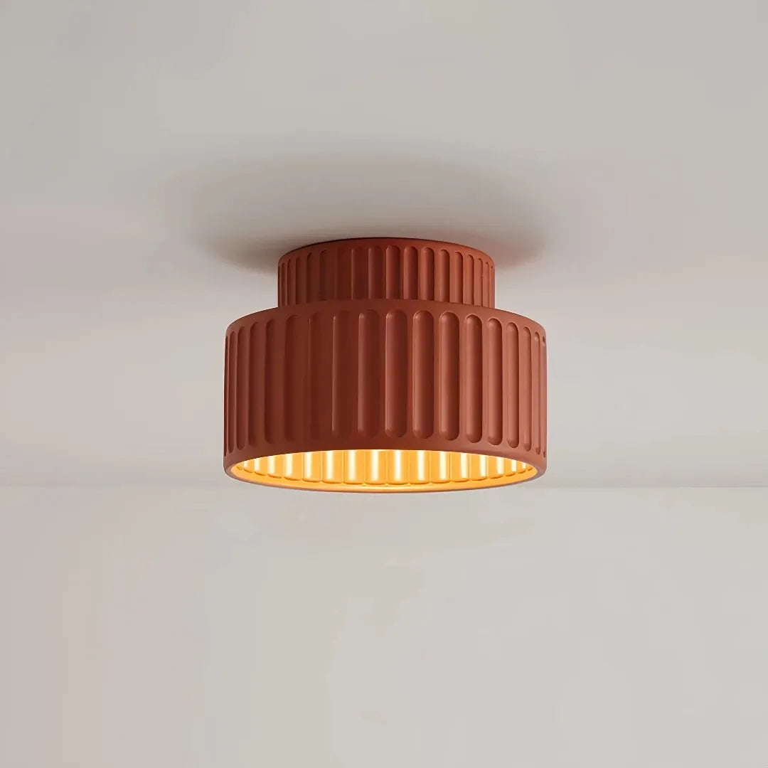Cream flush ceiling light mounted close to the ceiling