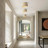 Cream ribbed ceiling light above a contemporary Hallway