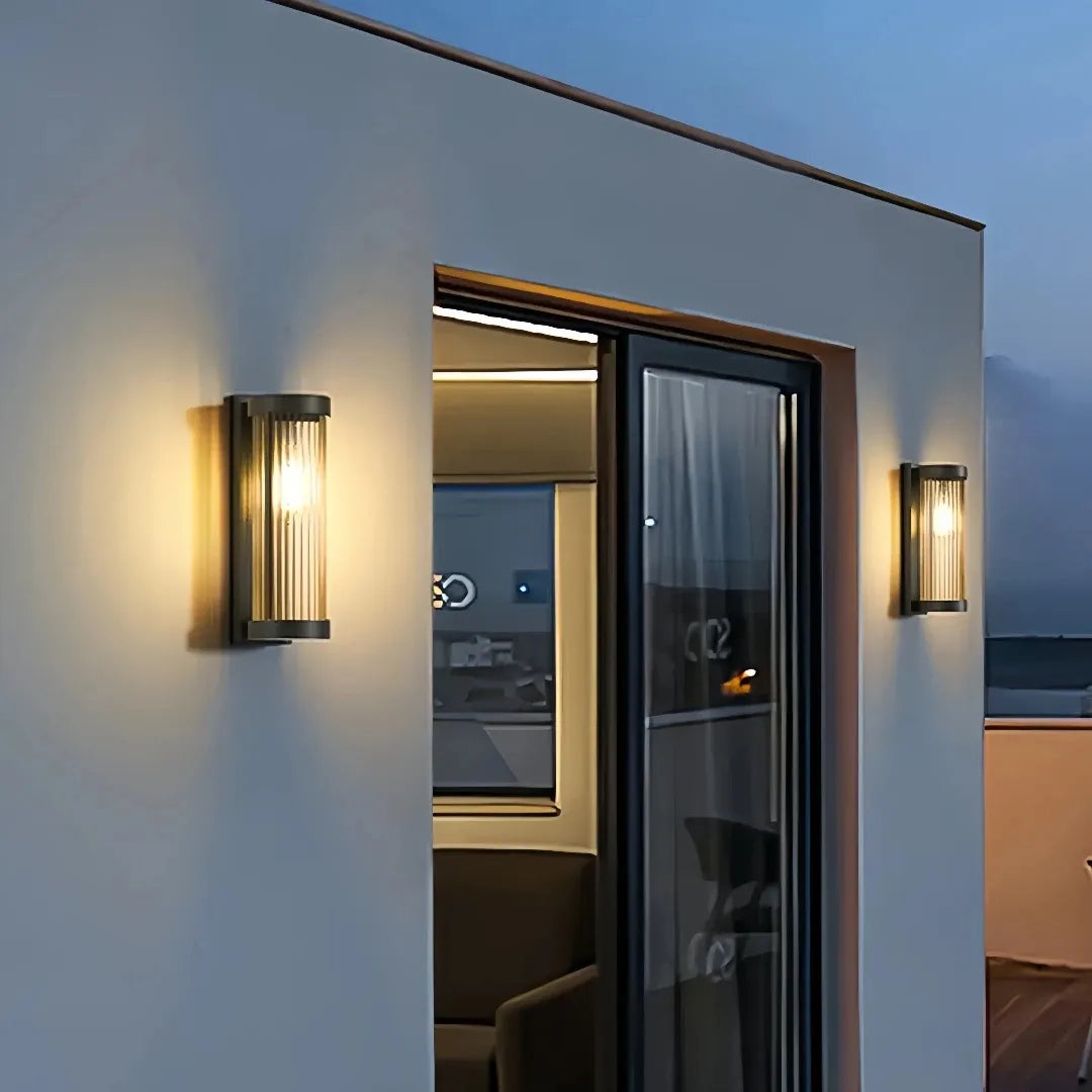 Modern ribbed glass outdoor wall light for a porch