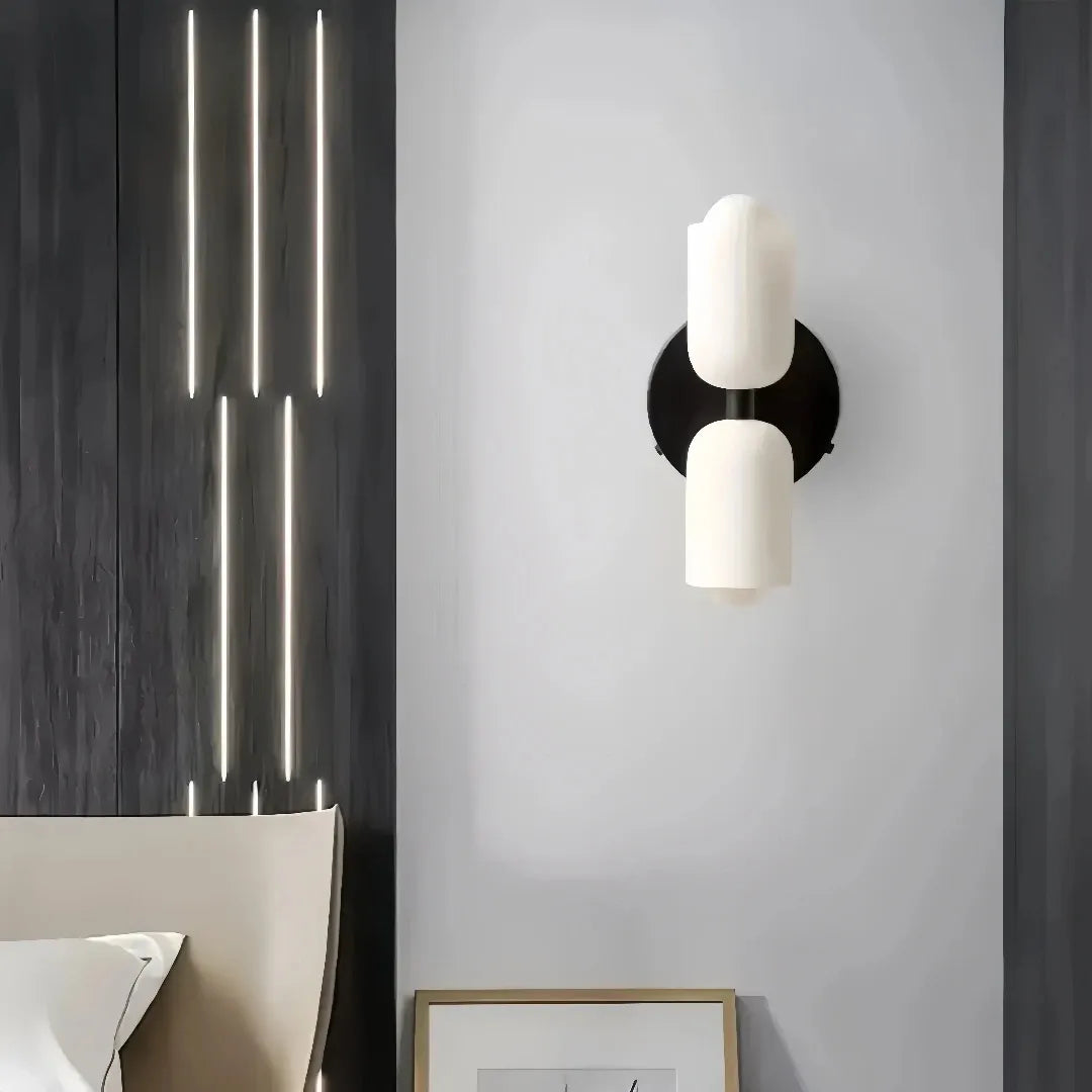 Black opal glass bedside wall light with up-and-down illumination