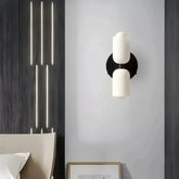 Black opal glass bedside wall light with up-and-down illumination