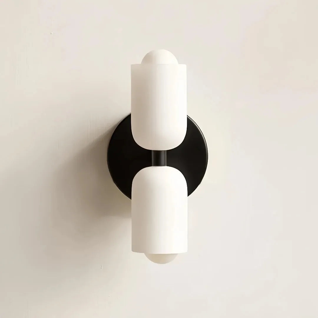 Indoor wall light casting soft light above and below the fitting