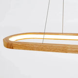Close-up of the wood grain, suspension cable and illuminated inner diffuser