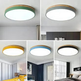 Round LED flush ceiling light shown in green, grey, yellow, blue and black