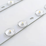 Wooden frame and acrylic diffuser detail of ceiling light