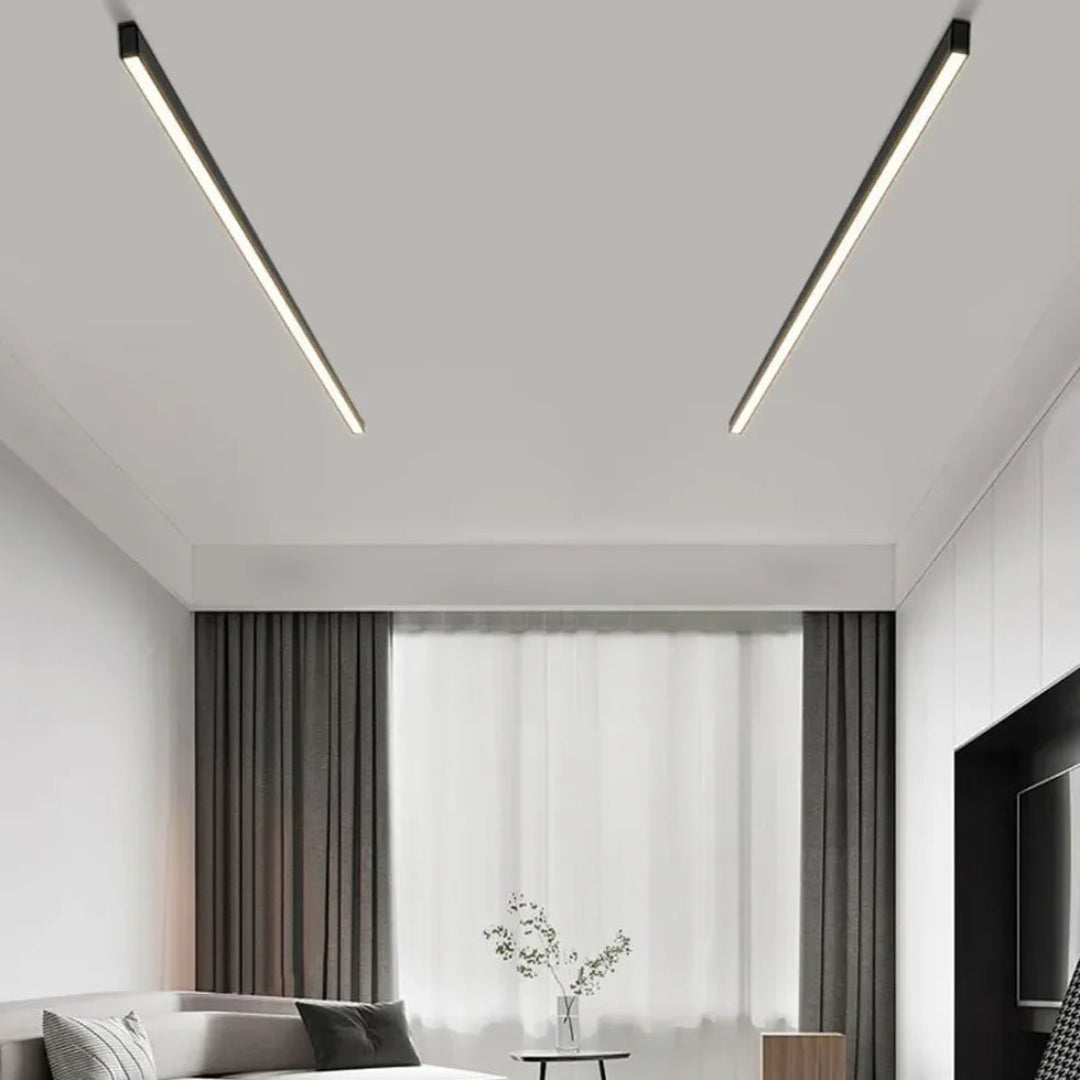 Black linear LED ceiling light shown switched on