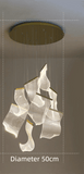 Modern Rotating Staircase Chandelier in a Living Room