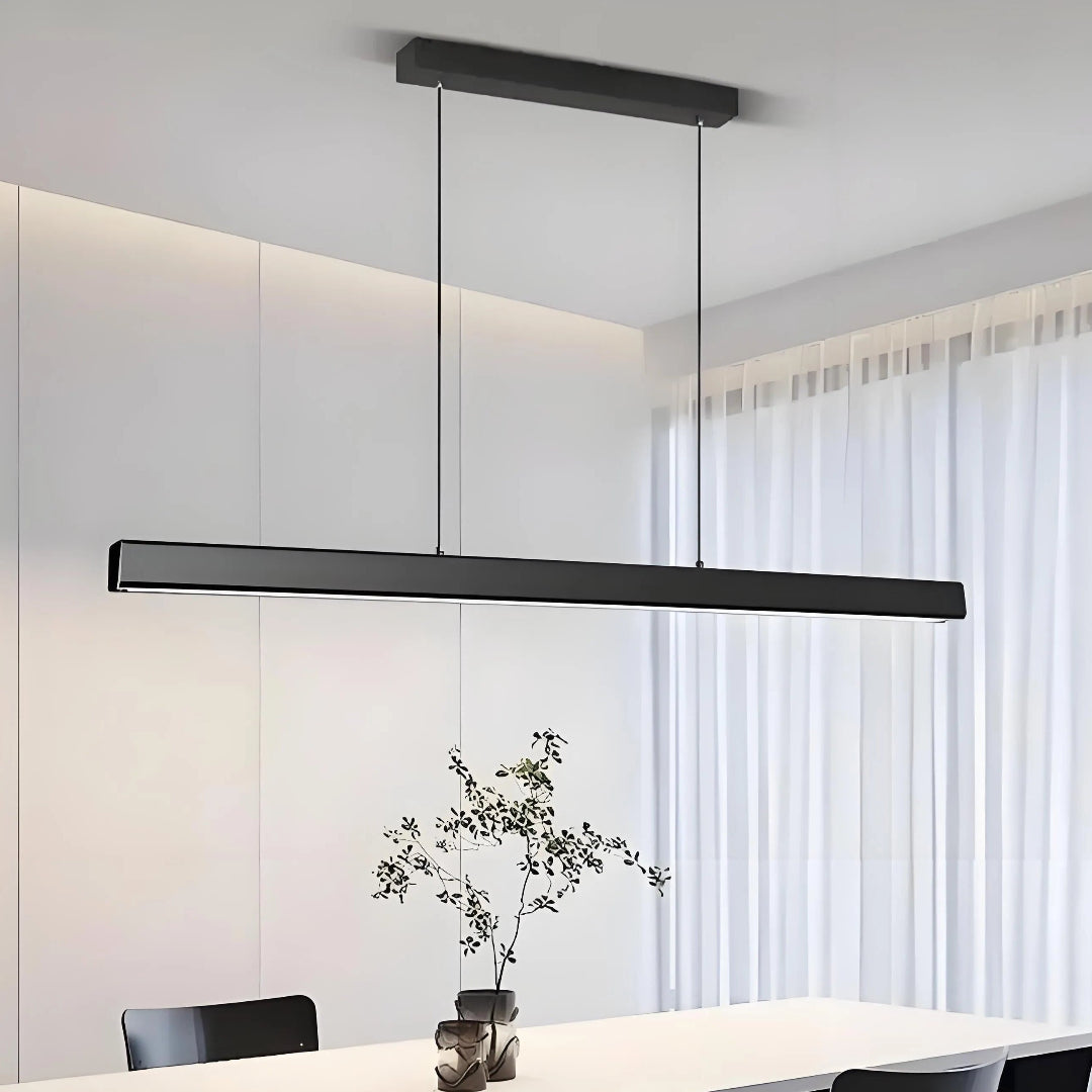 Minimalist black linear pendant light for a dining room