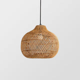Chinese Bamboo Woven Pendant Light Over Dining Table