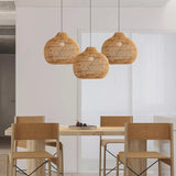 Chinese Bamboo Woven Pendant Light Over Dining Table