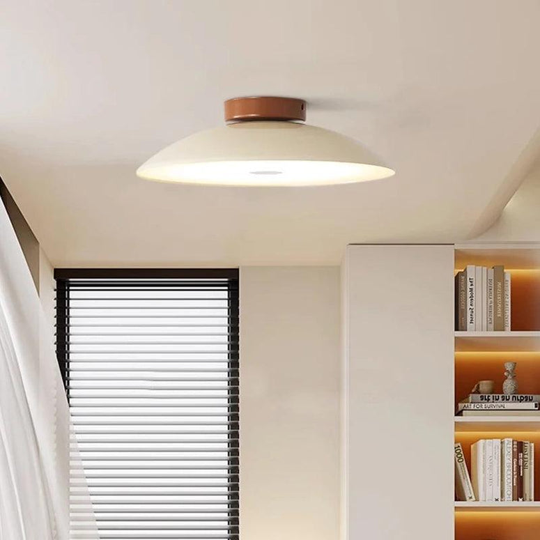 Decorative flush ceiling light with a soft sculptural shape for a stylish living room
