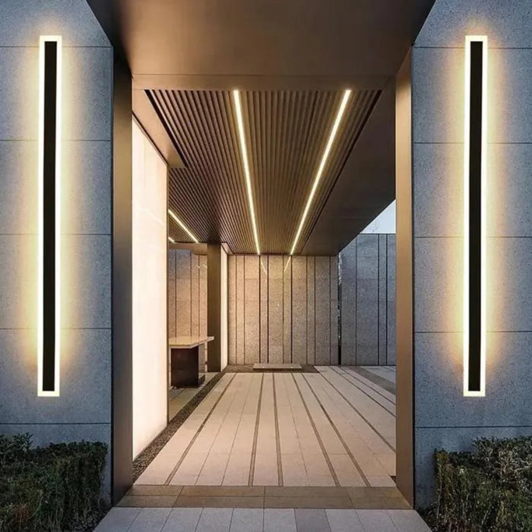 Black linear outdoor LED wall light in a slim black finish  