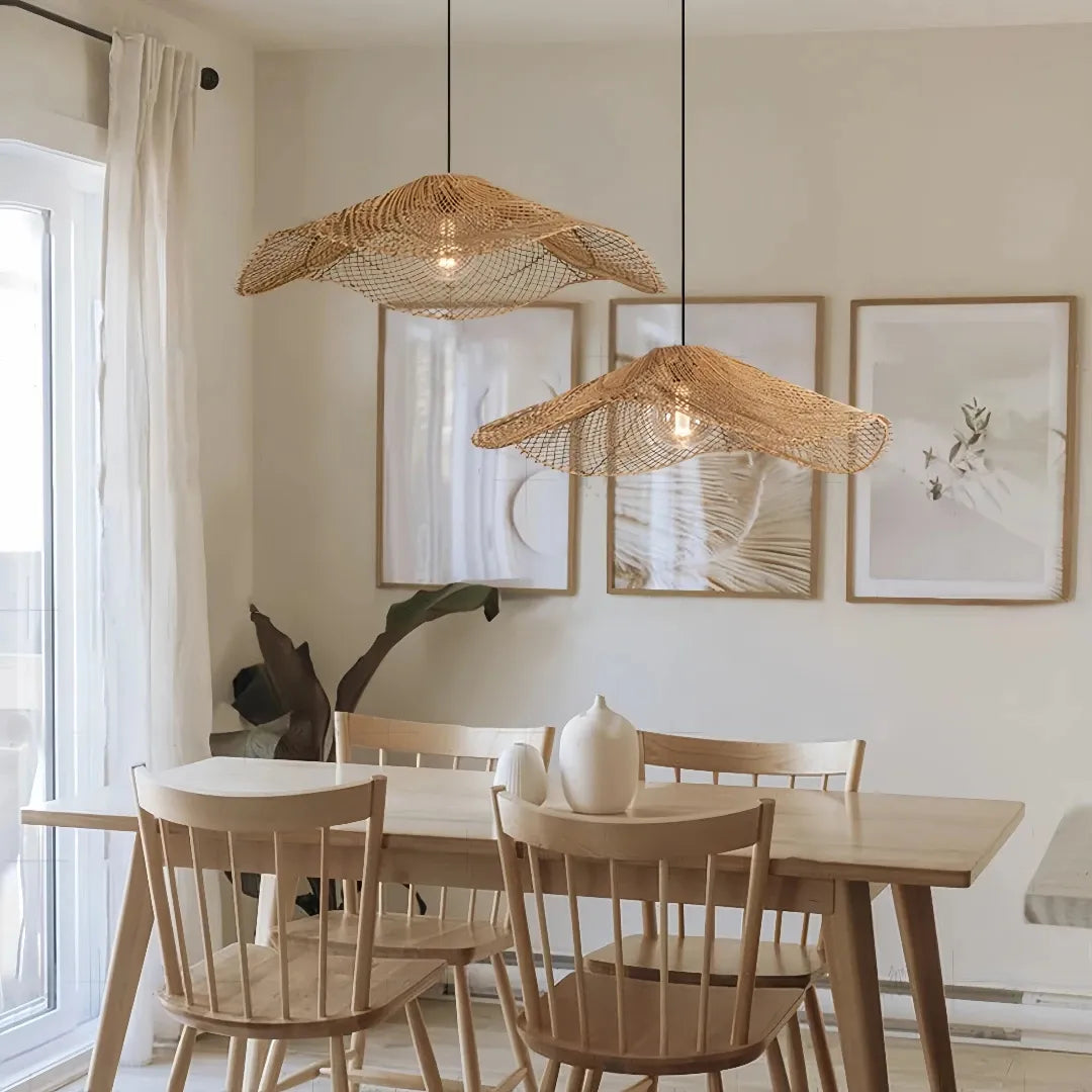 Two wave-shaped rattan pendants shown together in a living room setting