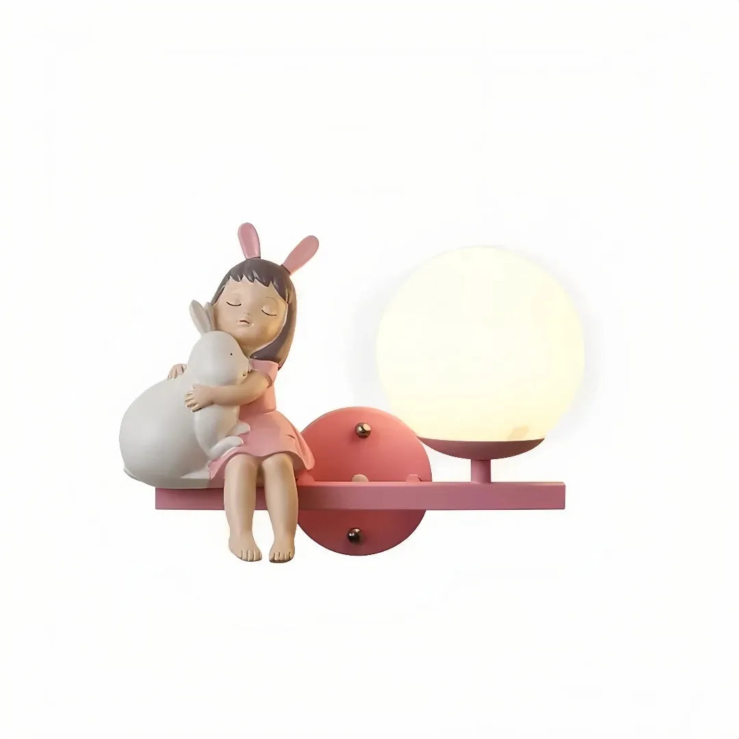 Side view of a resin cartoon girl wall light with glass shade