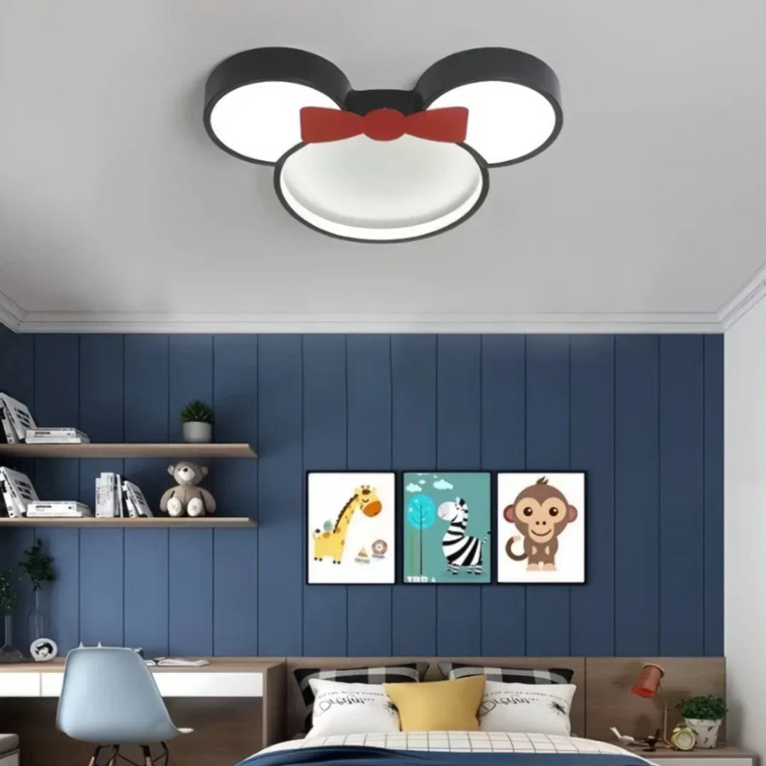 Cartoon mouse ceiling light installed in a kids bedroom